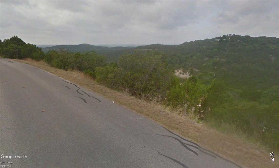 a view of a mountain view with mountains in the background