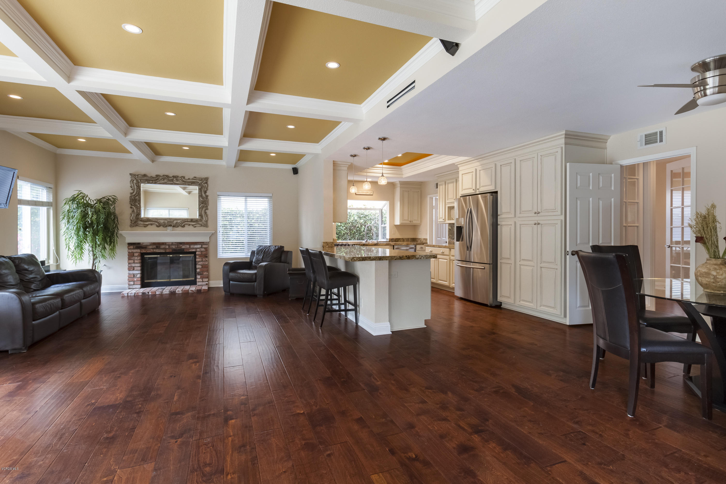 12142 Cherry Grove Street Moorpark, CA 93021 - Photo 2 of 36 a living room with furniture and a fireplace
