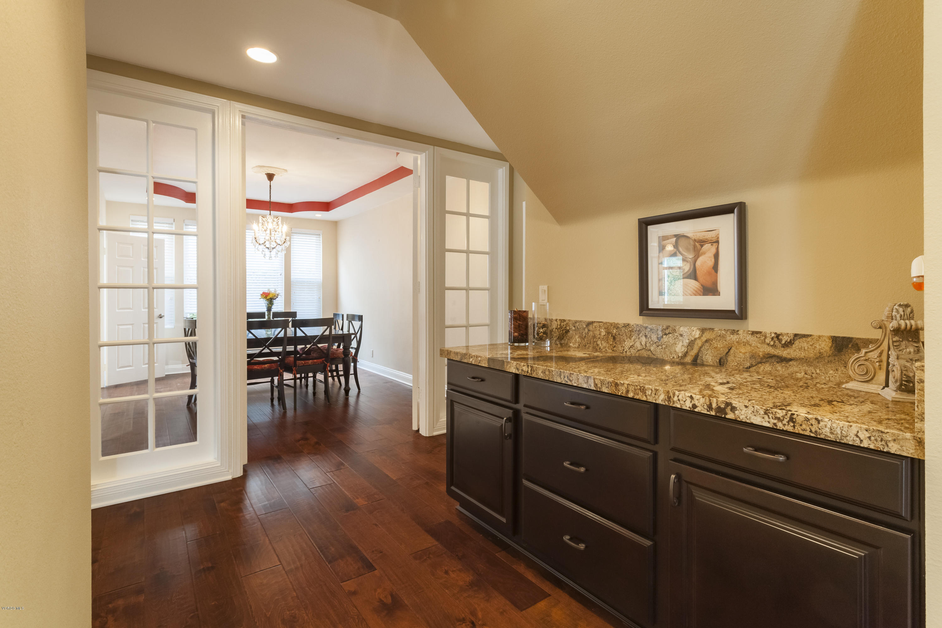 12142 Cherry Grove Street Moorpark, CA 93021 - Photo 13 of 36 a view of kitchen with granite countertop cabinets and wooden floor