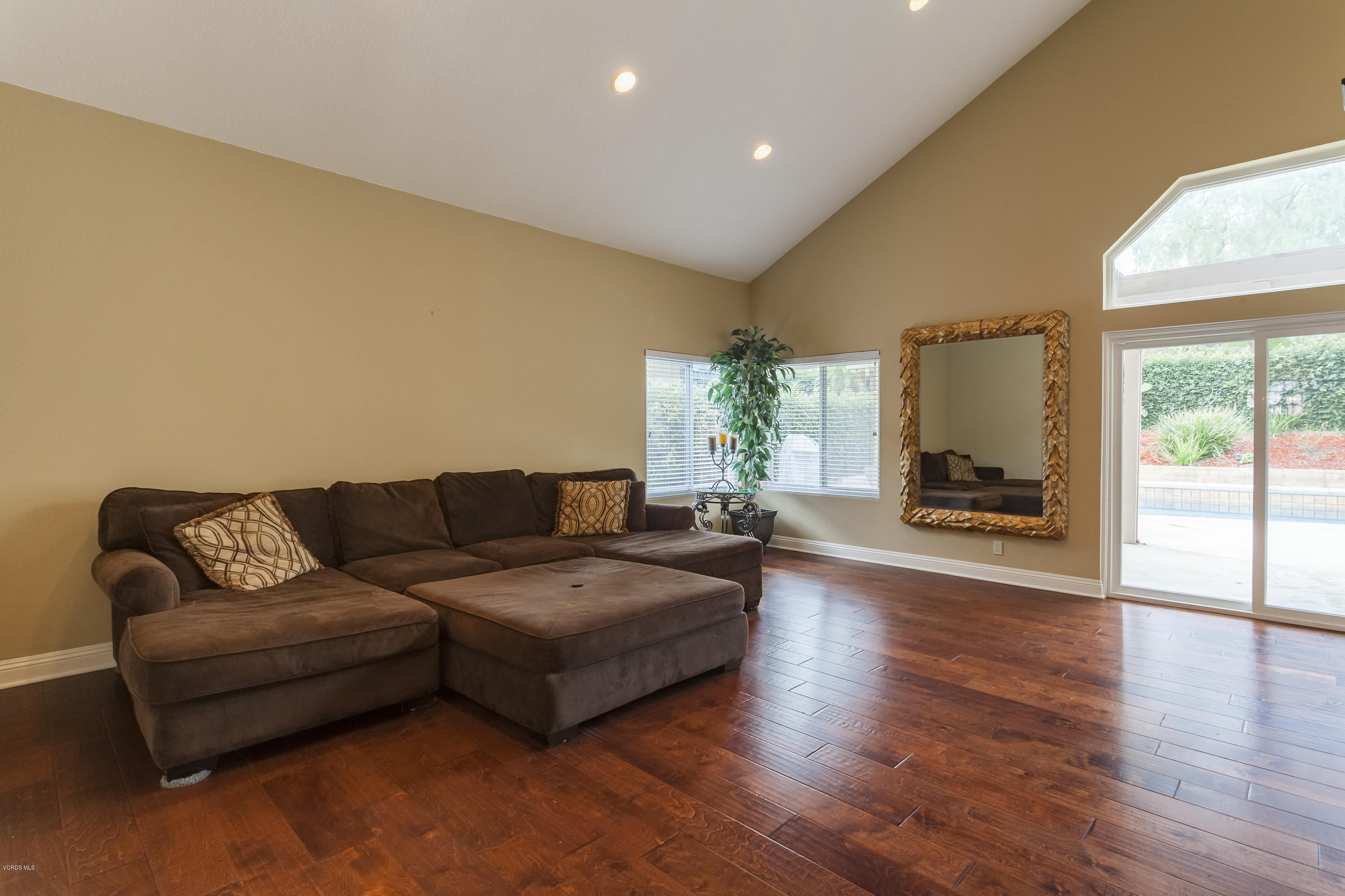 12142 Cherry Grove Street Moorpark, CA 93021 - Photo 22 of 36 a living room with furniture and a large window