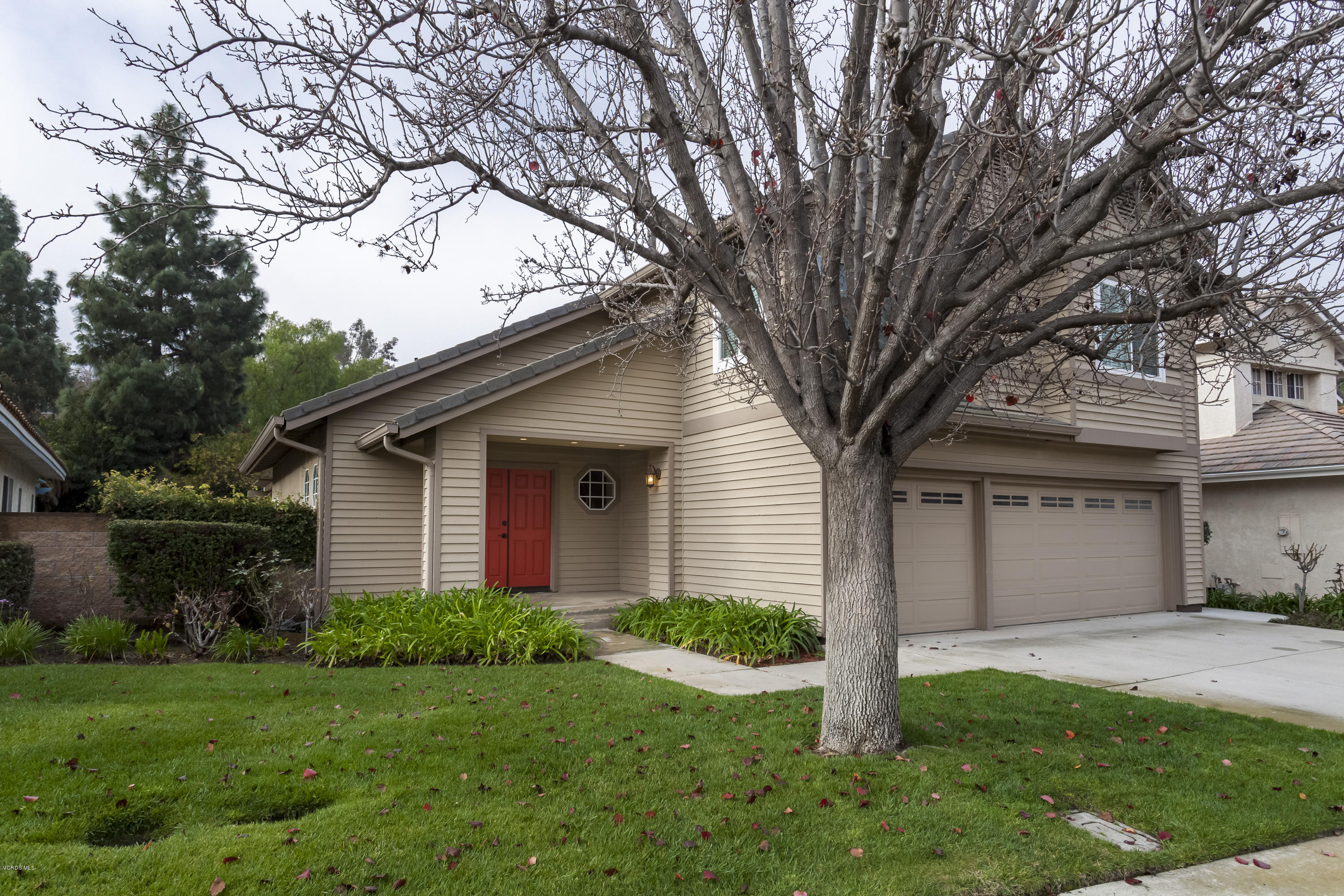 12142 Cherry Grove Street Moorpark, CA 93021 - Photo 24 of 36 a front view of house with a garden
