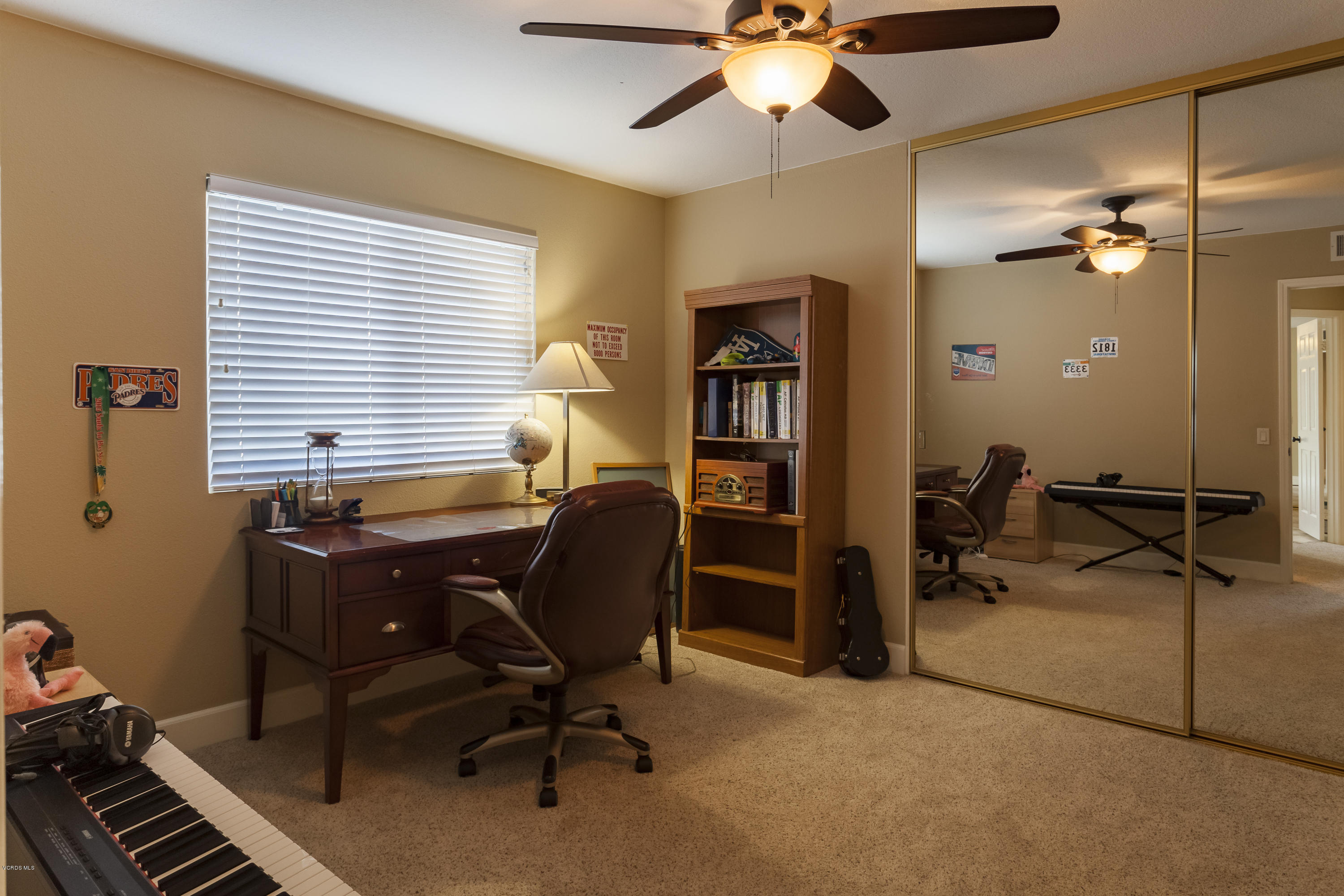 12142 Cherry Grove Street Moorpark, CA 93021 - Photo 27 of 36 a view of a workspace with furniture