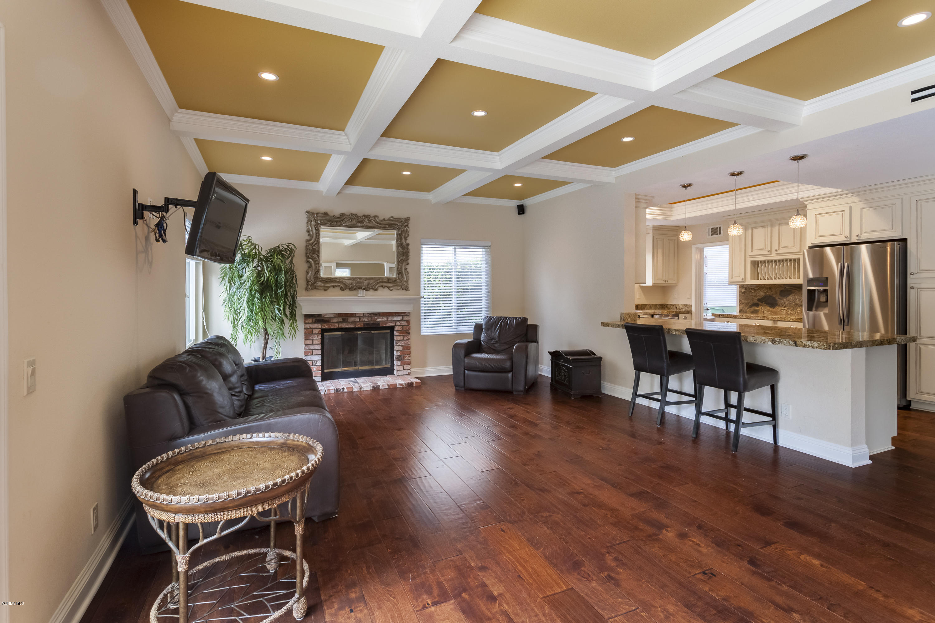 12142 Cherry Grove Street Moorpark, CA 93021 - Photo 4 of 36 a living room with furniture and a wooden floor