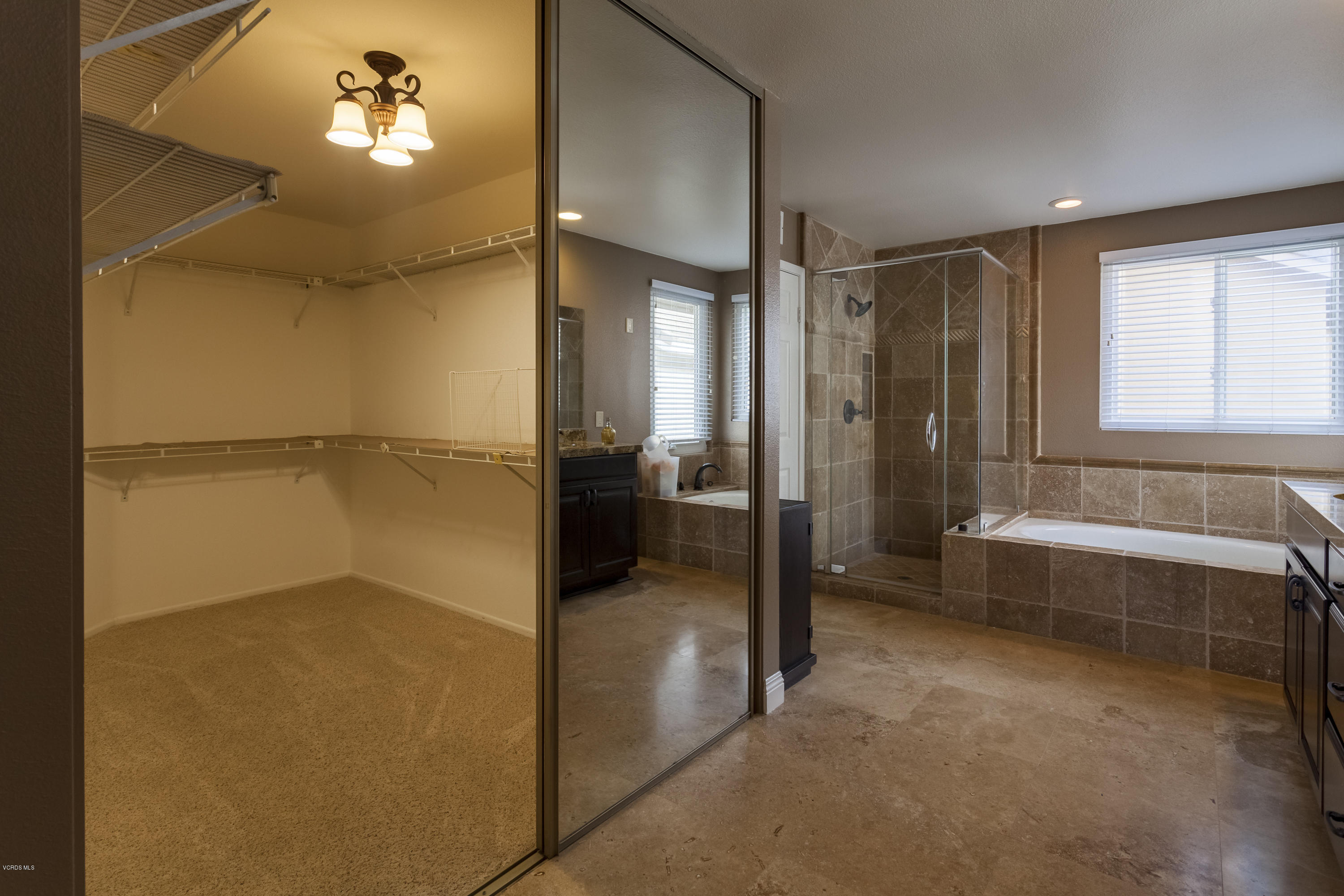 12142 Cherry Grove Street Moorpark, CA 93021 - Photo 31 of 36 a bathroom with a tub and shower