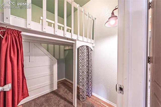 a view of front door with a mirror