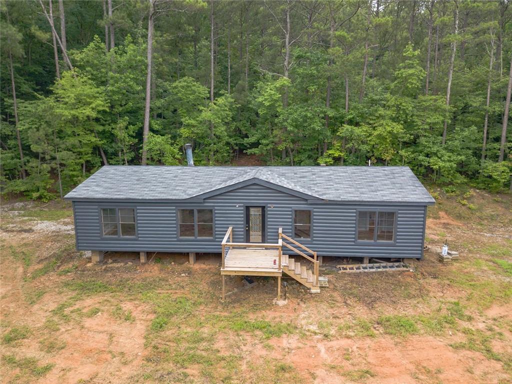 5212 North Helton Road Winston, GA 30187 - Photo 1 of 1 a house view with a garden space