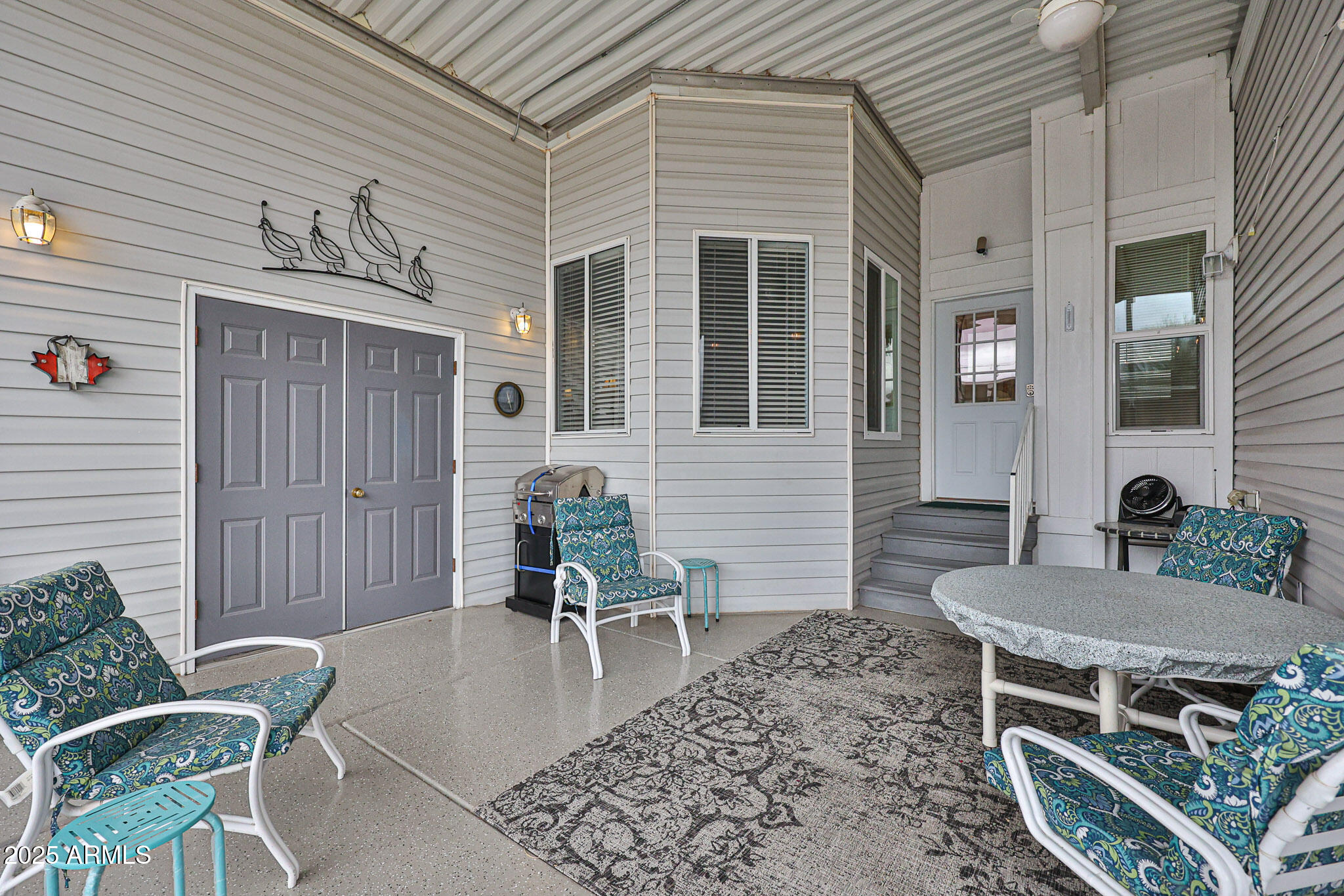 17200 West Bell Road, Unit 1185 Surprise, AZ 85374 - Photo 2 of 44 a living room filled with furniture