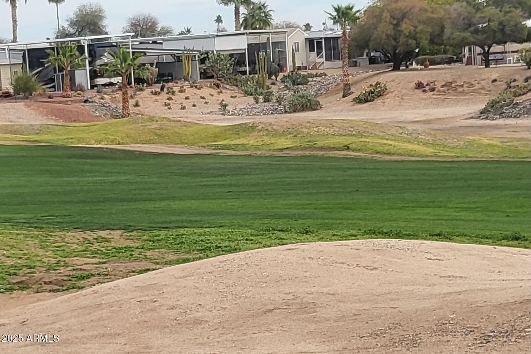 17200 West Bell Road, Unit 1185 Surprise, AZ 85374 - Photo 33 of 44 a view of a house with a swimming pool