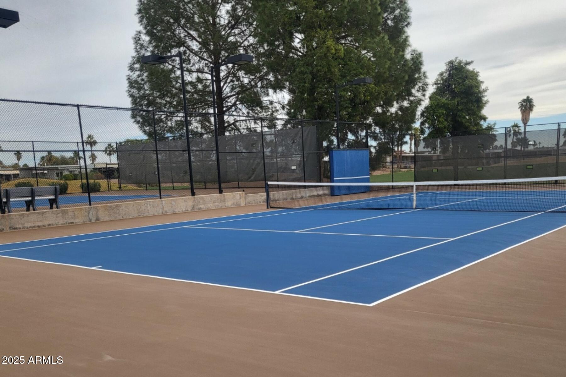 17200 West Bell Road, Unit 1185 Surprise, AZ 85374 - Photo 38 of 44 a view of outdoor space and tennis court
