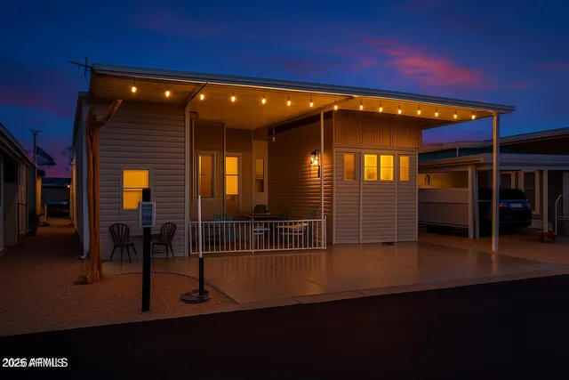 a view of swimming pool with seating space