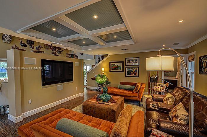 8150 Erwin Road Miami, FL 33143 - Photo 15 of 36 a living room with furniture and a flat screen tv