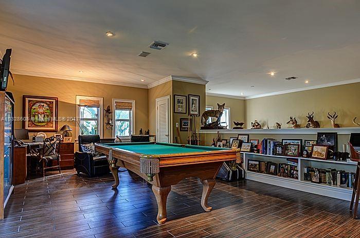 8150 Erwin Road Miami, FL 33143 - Photo 16 of 36 a room with furniture and gym equipment