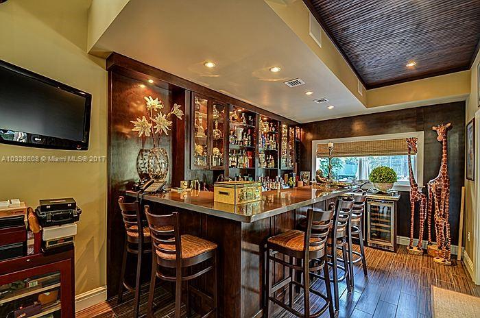 8150 Erwin Road Miami, FL 33143 - Photo 17 of 36 a view of a dining room with furniture window and outside view