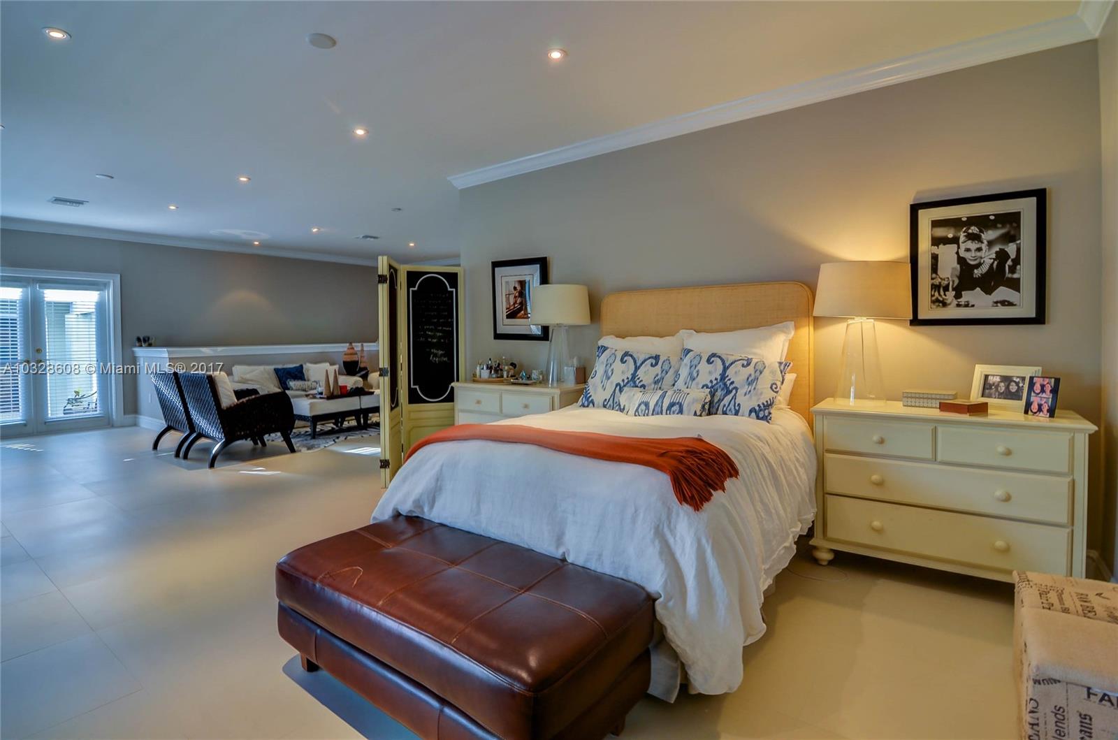 8150 Erwin Road Miami, FL 33143 - Photo 23 of 36 a bedroom with a bed and furniture