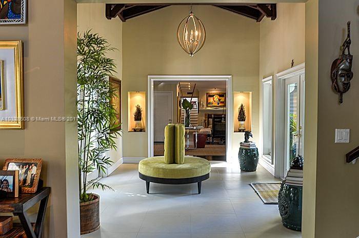 8150 Erwin Road Miami, FL 33143 - Photo 3 of 36 a view of a livingroom with furniture and chandelier