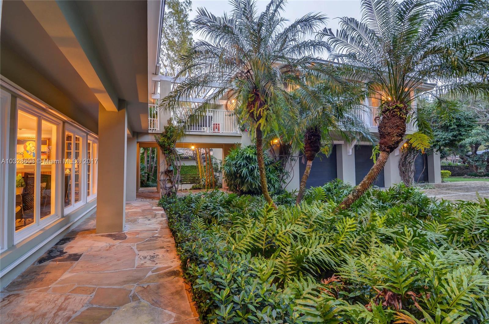 8150 Erwin Road Miami, FL 33143 - Photo 31 of 36 a view of a building with a yard