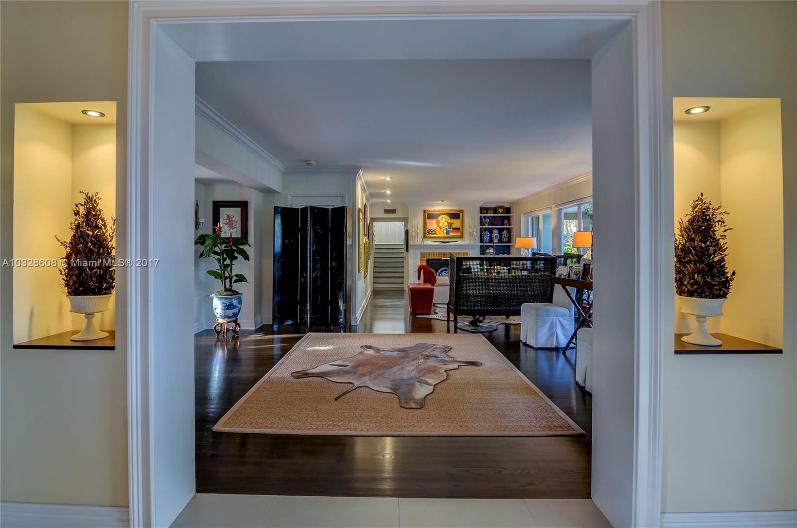 8150 Erwin Road Miami, FL 33143 - Photo 4 of 36 a view of kitchen with kitchen island dining table and chairs