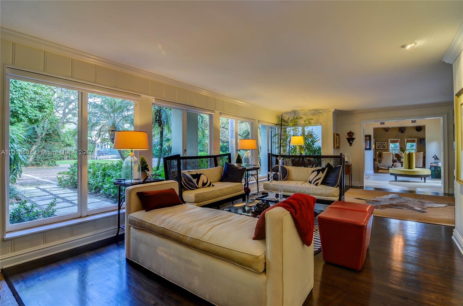 8150 Erwin Road Miami, FL 33143 - Photo 5 of 36 a living room with furniture and a large window