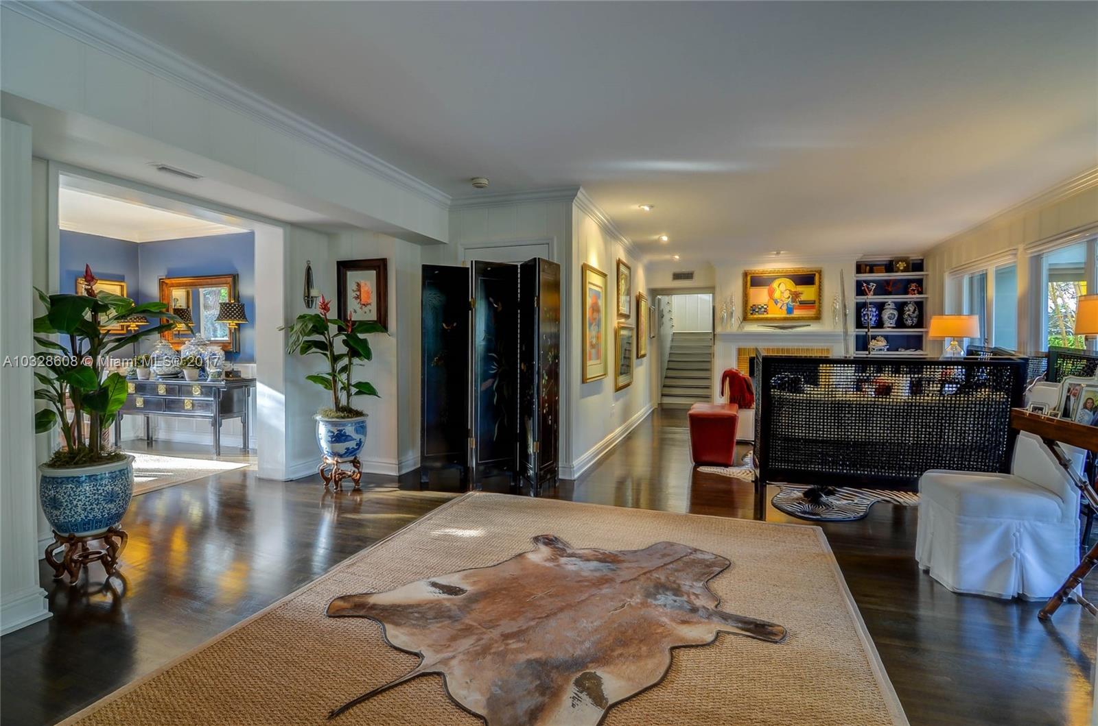 8150 Erwin Road Miami, FL 33143 - Photo 6 of 36 a living room with furniture and a flat screen tv