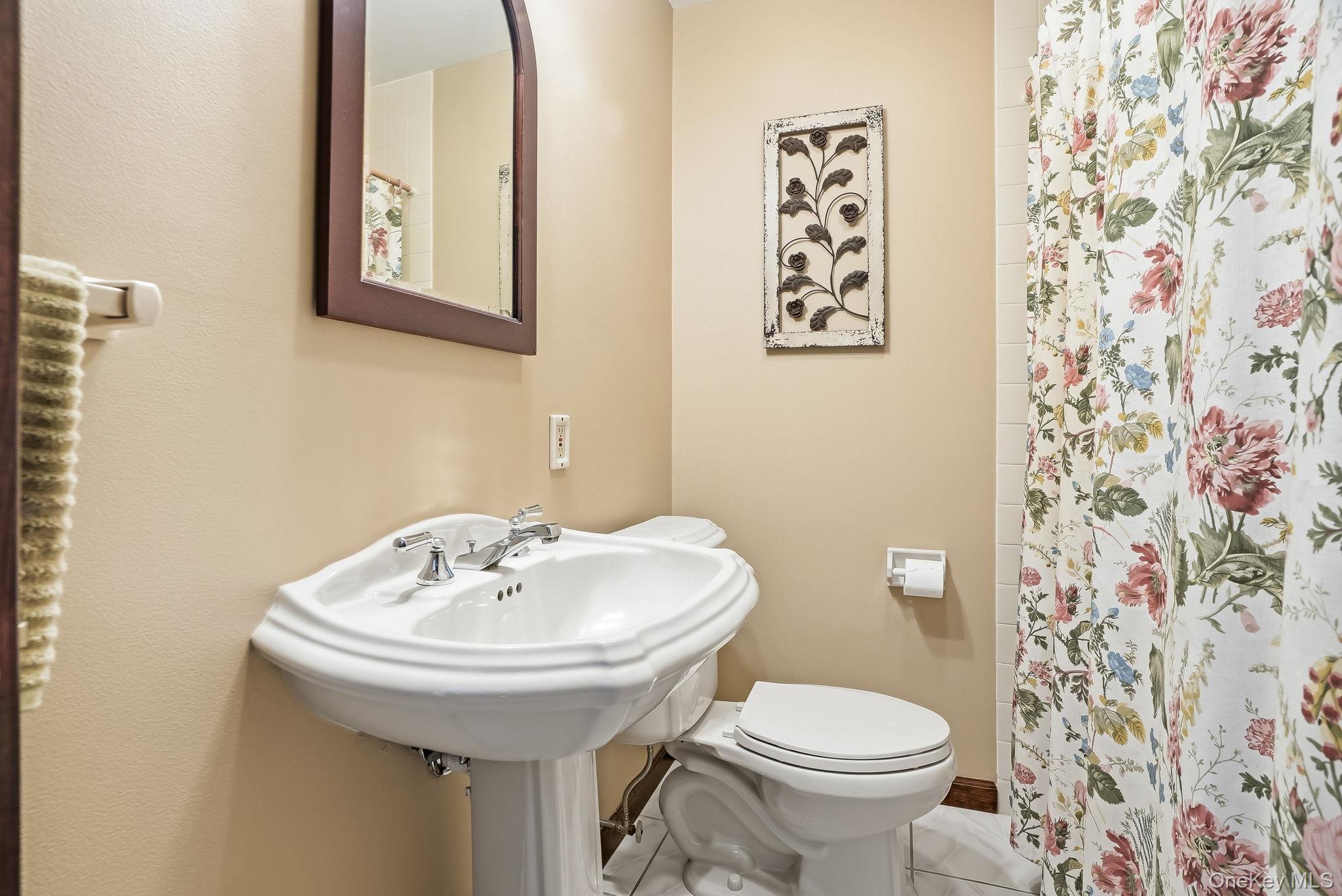 73 Sunset Road Montrose, NY 10548 - Photo 19 of 41 Nope - it's not just a powder room! There's a second full bathroom on the main floor.