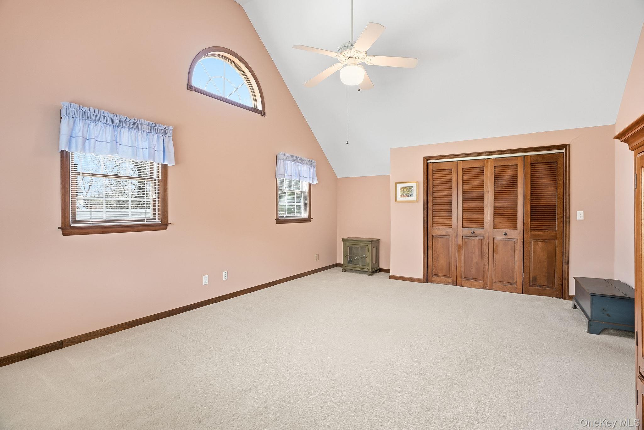 73 Sunset Road Montrose, NY 10548 - Photo 28 of 41 The almost twin end bedrooms have vaulted ceilings and plenty of closet space.