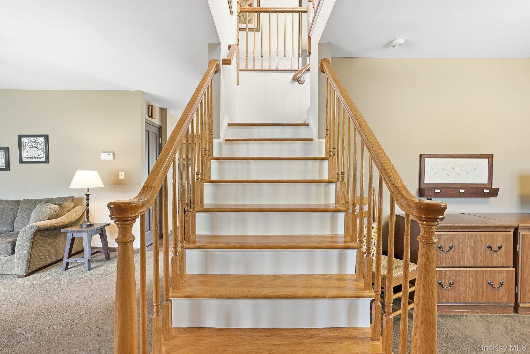 73 Sunset Road Montrose, NY 10548 - Photo 8 of 41 The open stairs lead to a bonus sitting area with vaulted ceilings.
