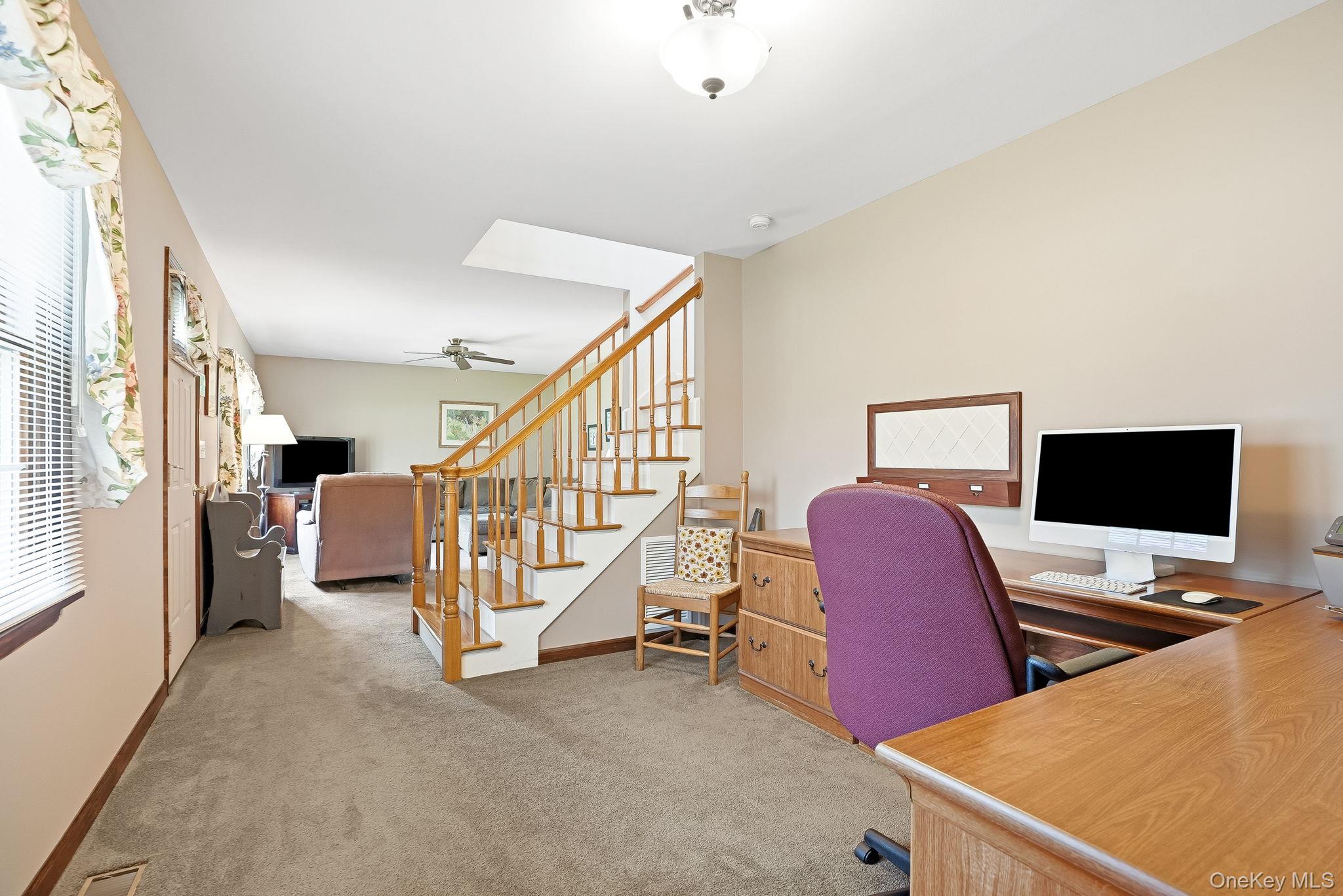 73 Sunset Road Montrose, NY 10548 - Photo 9 of 41 Heading to the main level owner's suite is a perfect space to work from home.