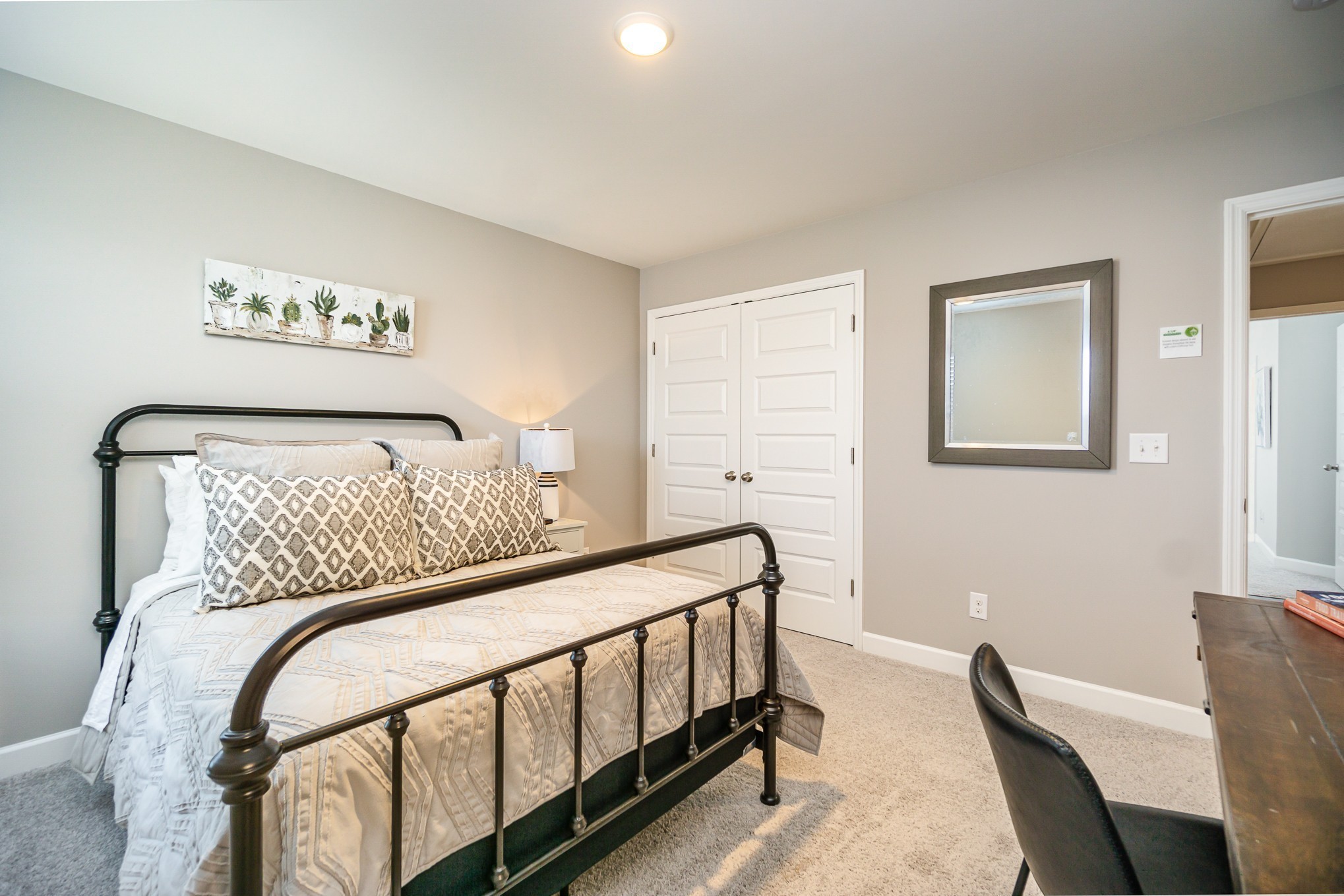 1748 Fenway Loop Antioch, TN 37013 - Photo 27 of 38 a bedroom with a bed and wooden floor