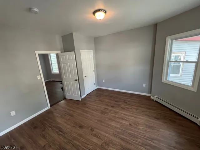 wooden floor and windows in an empty room