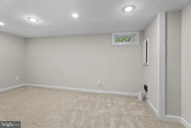 a front view of a house with garden and porch