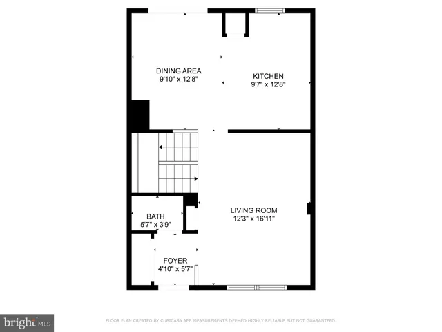 a picture of a bench in front of a white house