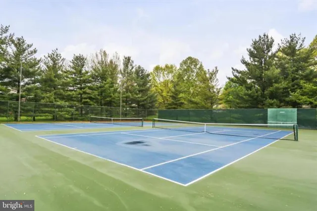 a view of a street with seating space
