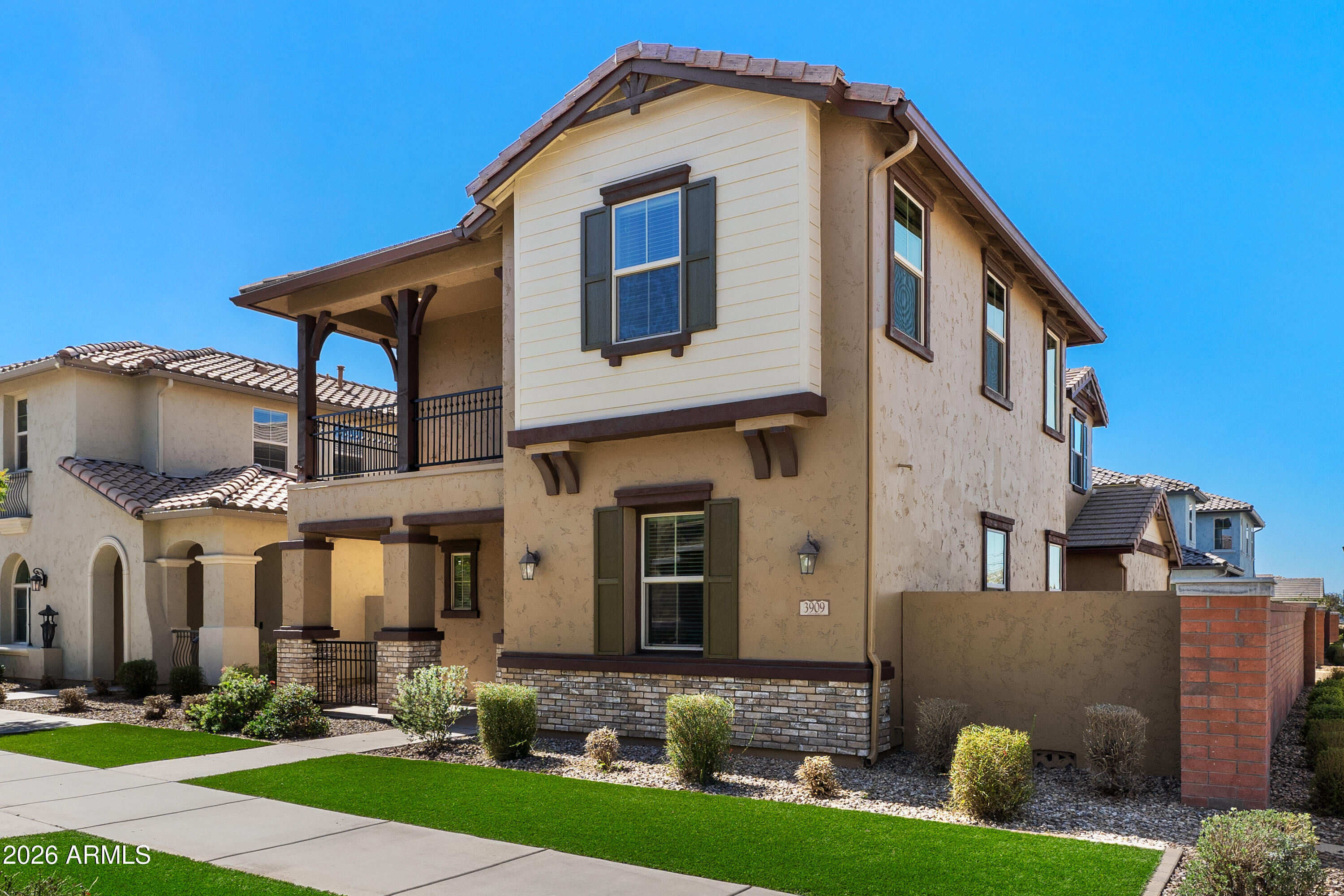 3909 East Perkinsville Street Gilbert, AZ 85295 - Photo 1 of 29 a front view of a house with garden