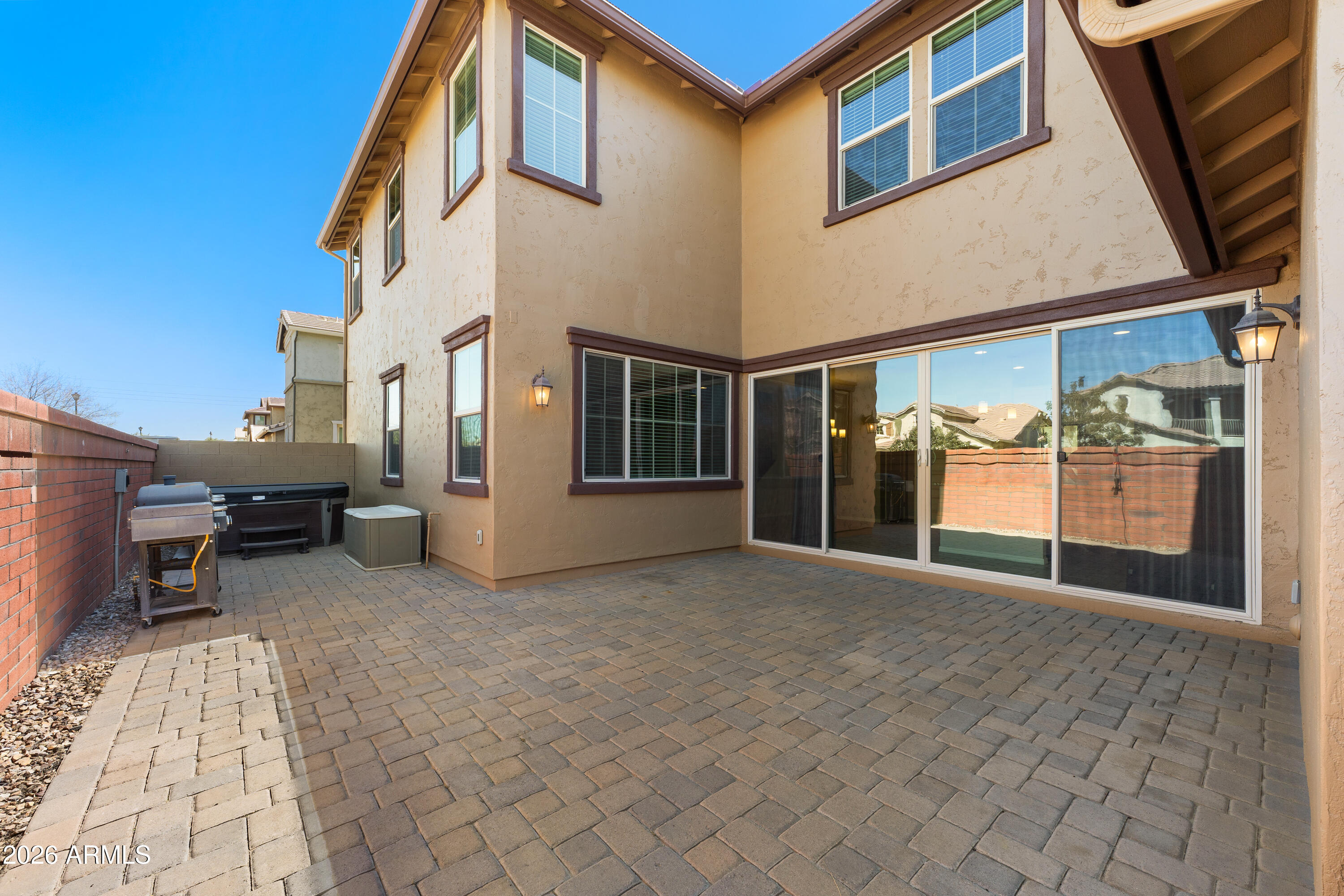 3909 East Perkinsville Street Gilbert, AZ 85295 - Photo 12 of 29 a view of a house with backyard and a barbeque