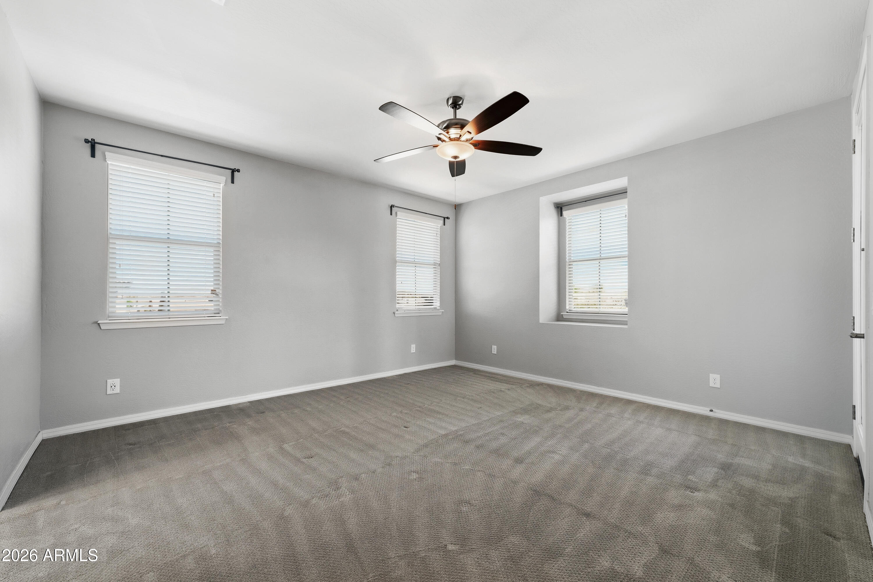 3909 East Perkinsville Street Gilbert, AZ 85295 - Photo 19 of 29 a view of an empty room with a window