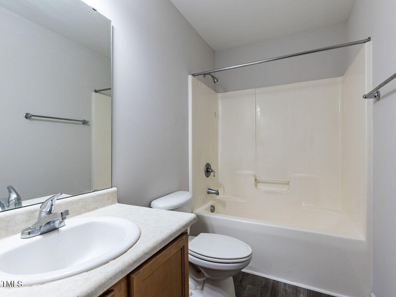 381 Gray Ghost Street Benson, NC 27504 - Photo 21 of 33 a bathroom with a sink and a mirror