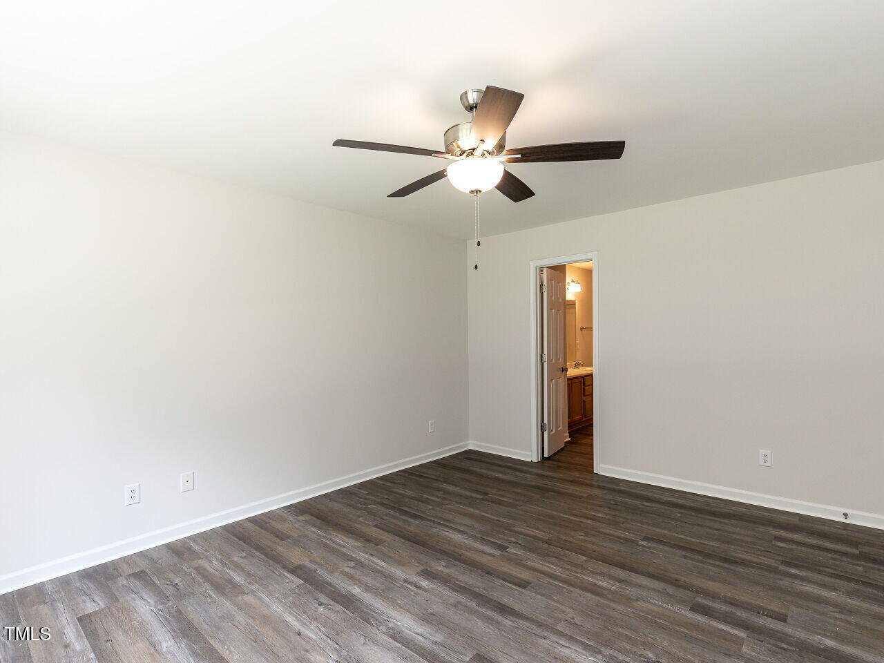 381 Gray Ghost Street Benson, NC 27504 - Photo 26 of 33 a view of room with wooden floor