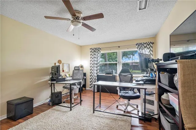 a bedroom with furniture and a chandelier