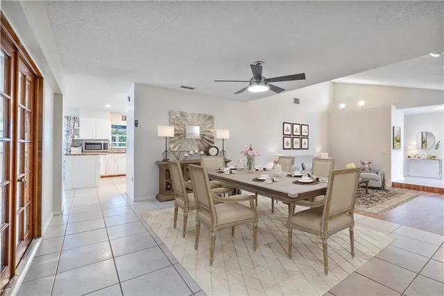 a view of a dining room with furniture