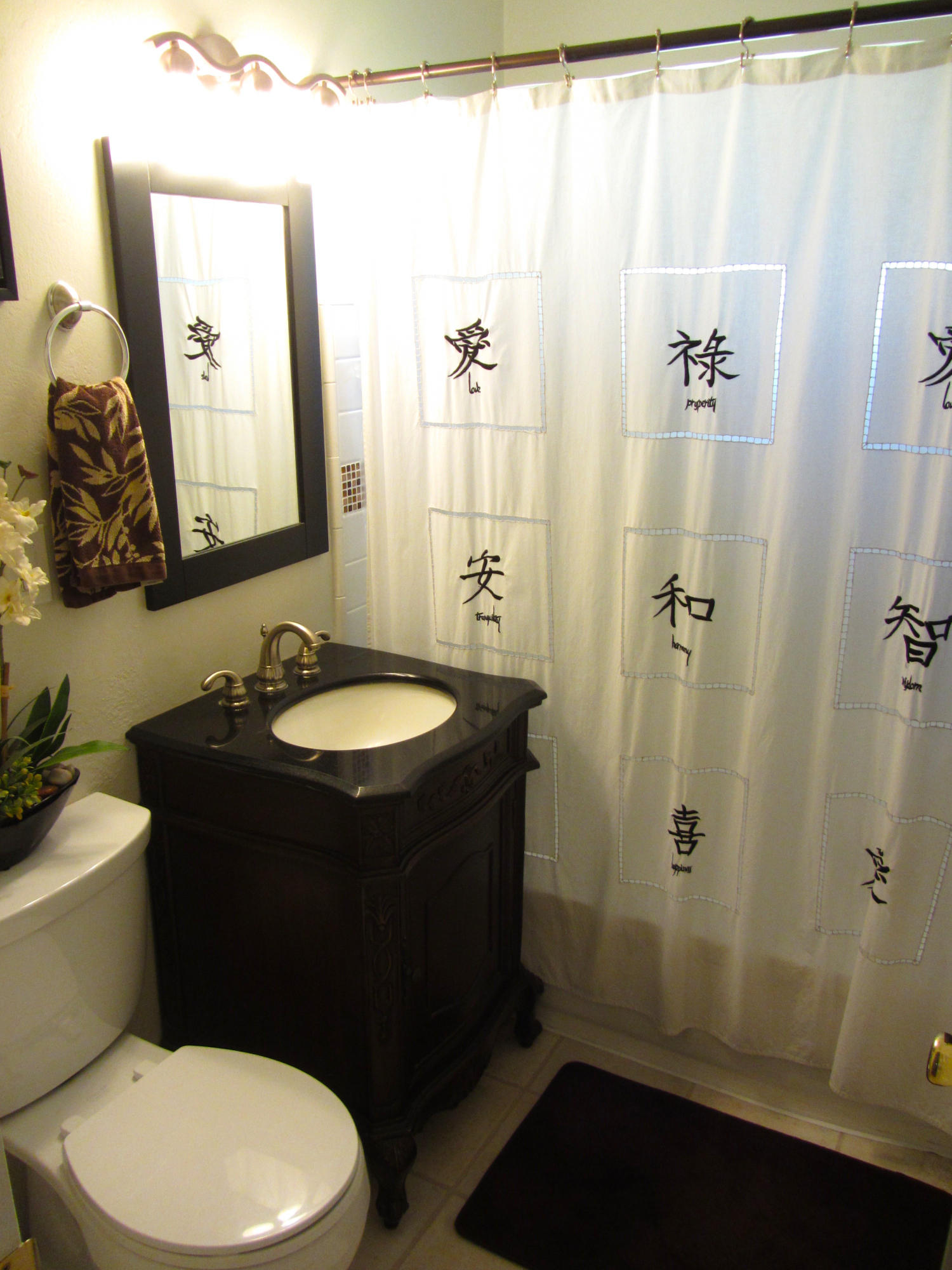 2862 Irwin Road Redding, CA 96002 - Photo 12 of 19 a bathroom with a sink vanity mirror and toilet