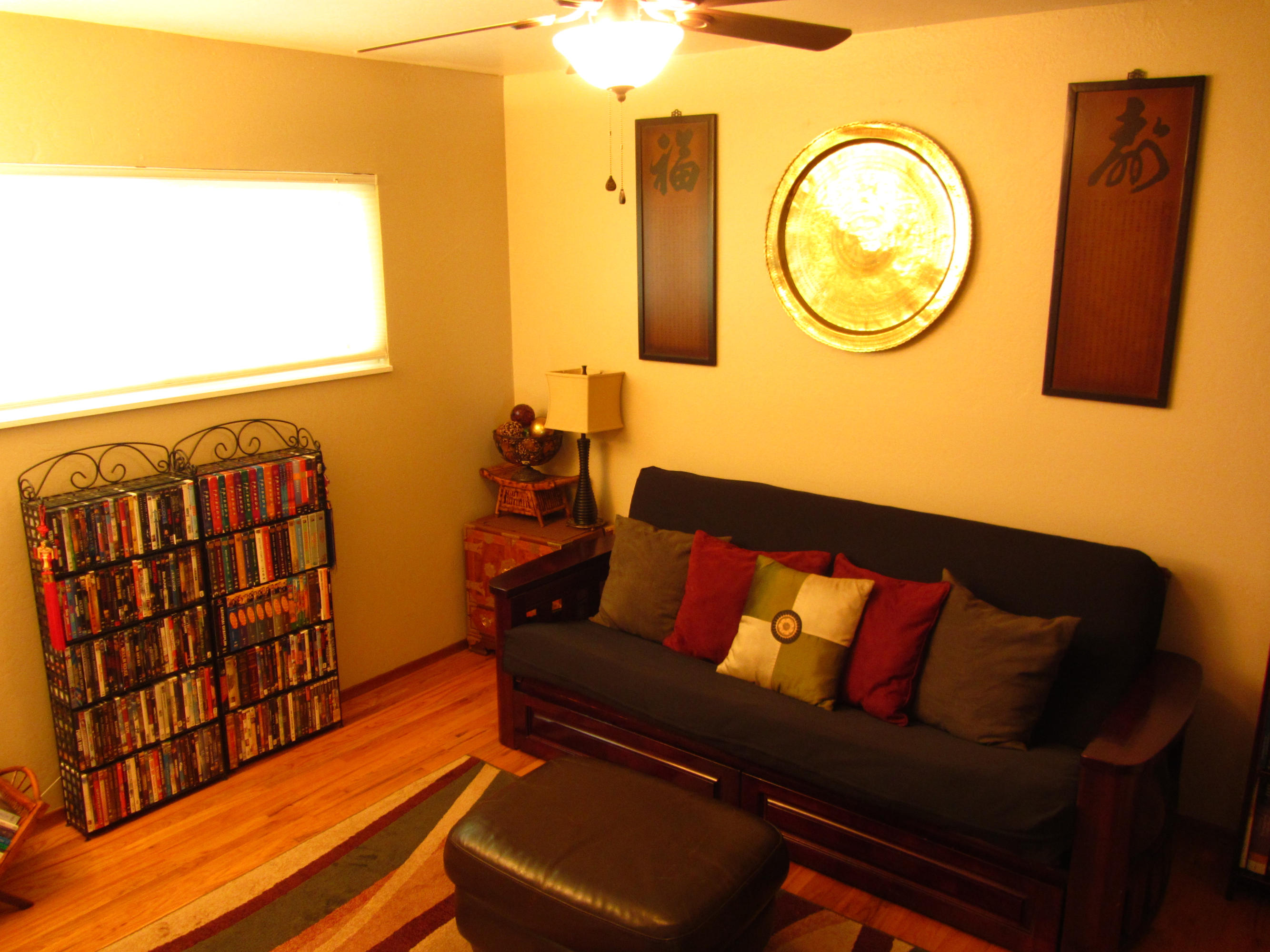 2862 Irwin Road Redding, CA 96002 - Photo 13 of 19 a living room with a couch and dresser