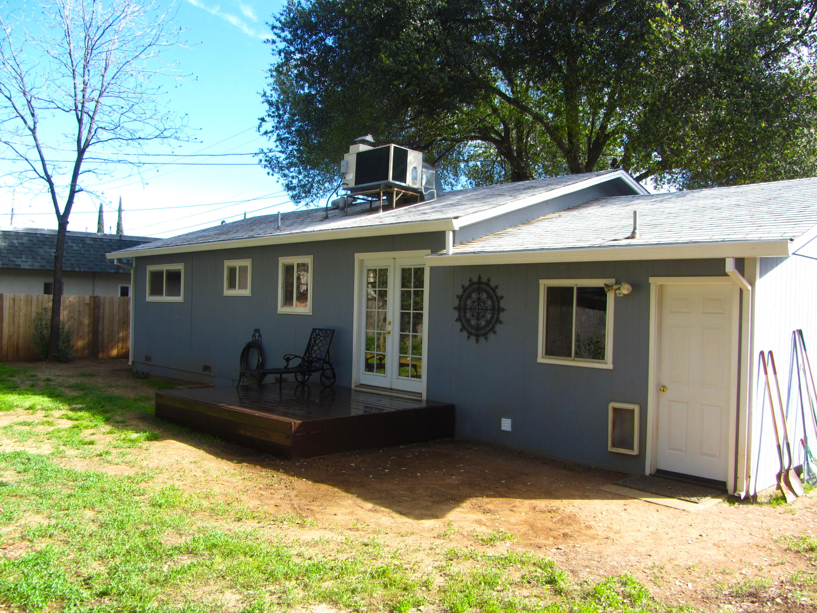 2862 Irwin Road Redding, CA 96002 - Photo 19 of 19 a front view of house with yard outdoor seating and barbeque oven