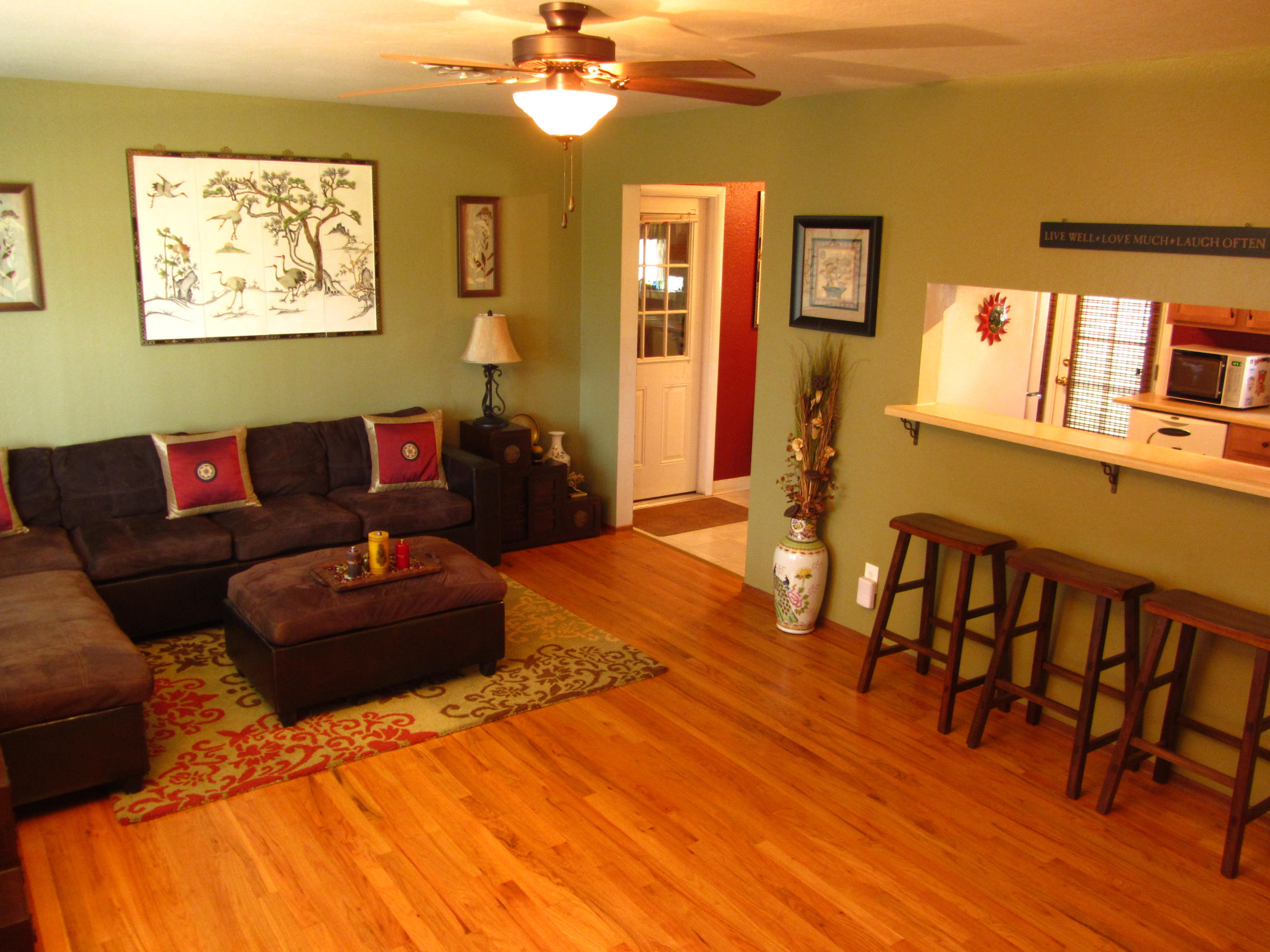 2862 Irwin Road Redding, CA 96002 - Photo 2 of 19 a living room with furniture and wooden floor
