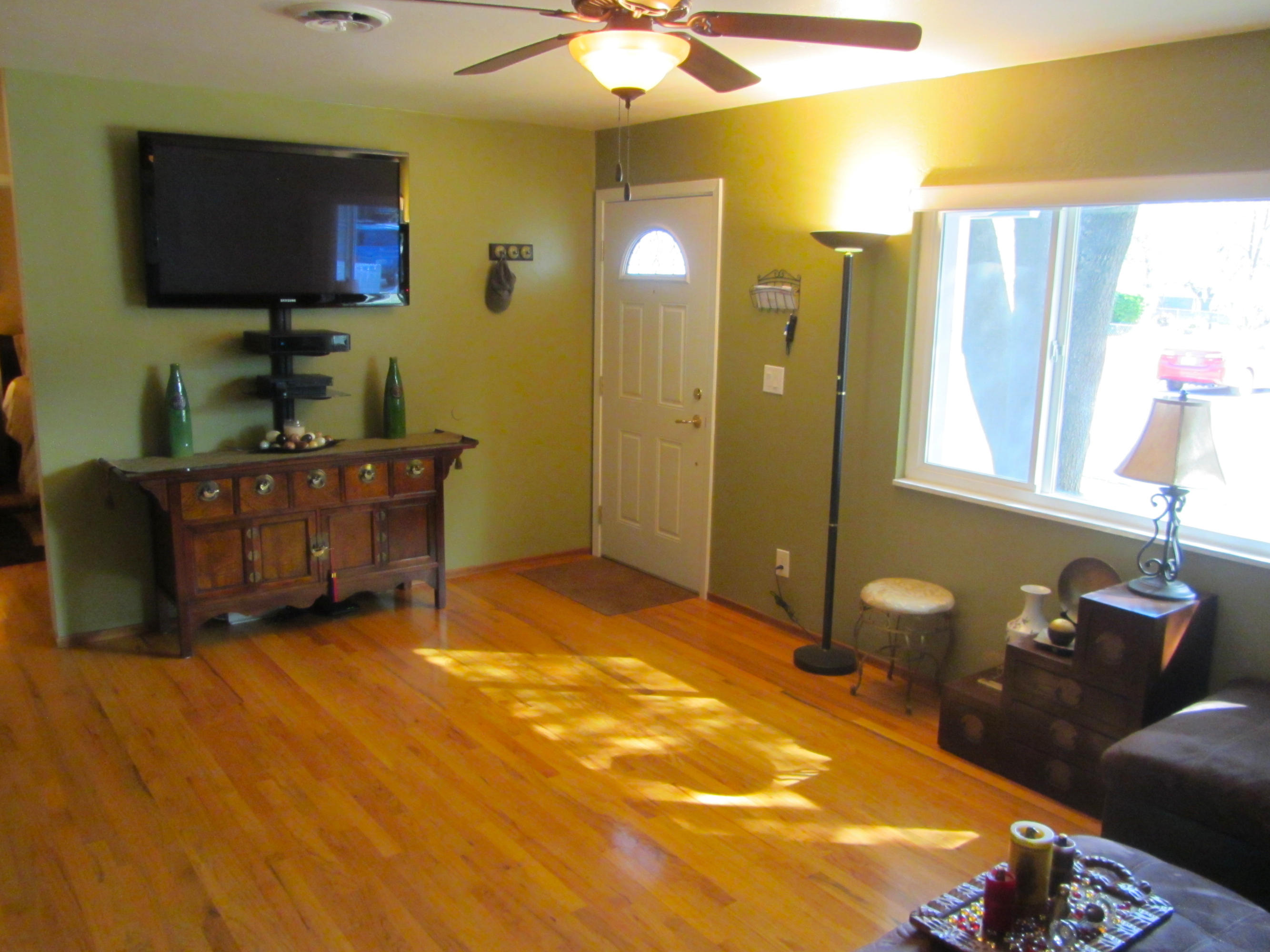 2862 Irwin Road Redding, CA 96002 - Photo 8 of 19 a bedroom with a bed and a flat screen tv