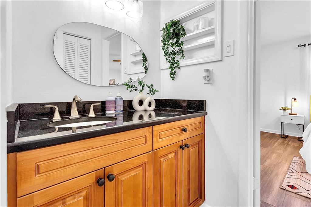 3571 Turner Heights Drive Decatur, GA 30032 - Photo 42 of 51 a bathroom with a sink and a mirror