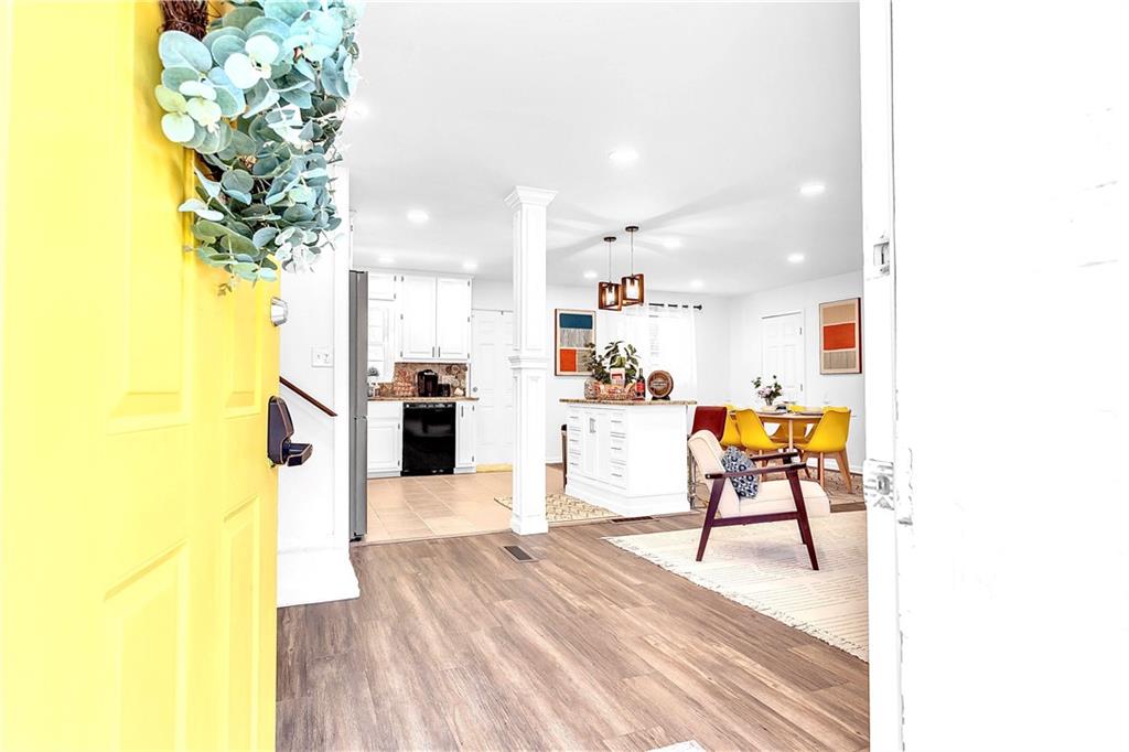 3571 Turner Heights Drive Decatur, GA 30032 - Photo 5 of 51 a living room with furniture and a kitchen view