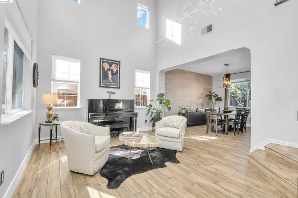 a living room with furniture and a table