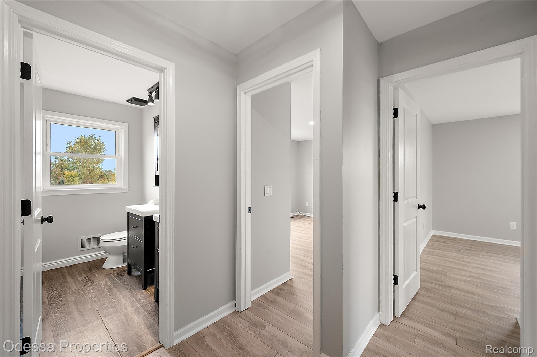 1442 Riley Center Road Memphis, MI 48041 - Photo 32 of 62 Hallway with light wood finished floors