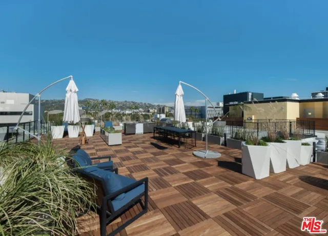 a view of a terrace with seating space