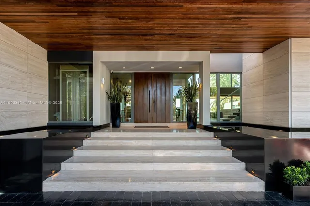 a view of a table and chairs in the patio